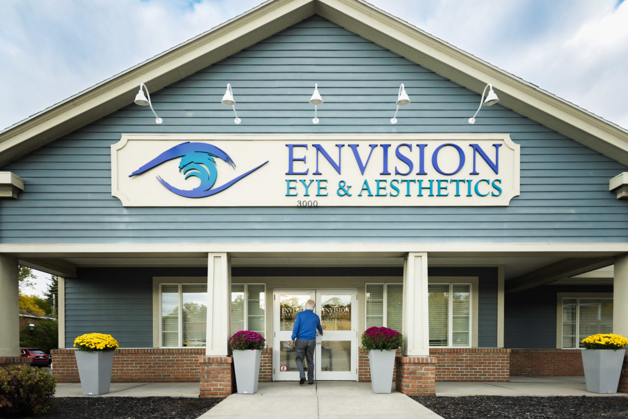 Opening the door of Envision Eye and Aesthetics in Rochester NY.